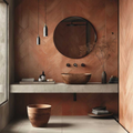 Modern bathroom with wooden vanity, round mirror, and pendant lights.