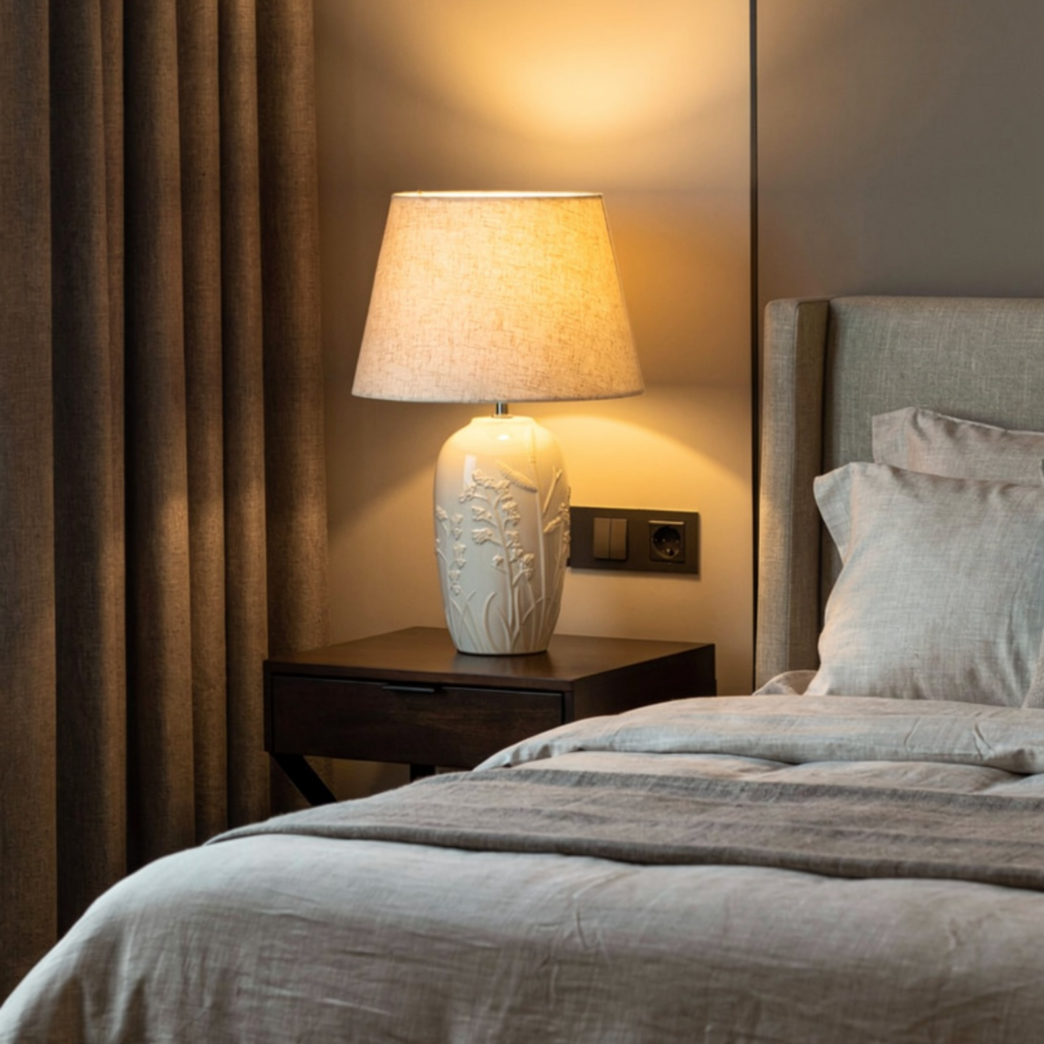 Bedroom with a bed, nightstand, and lamp
